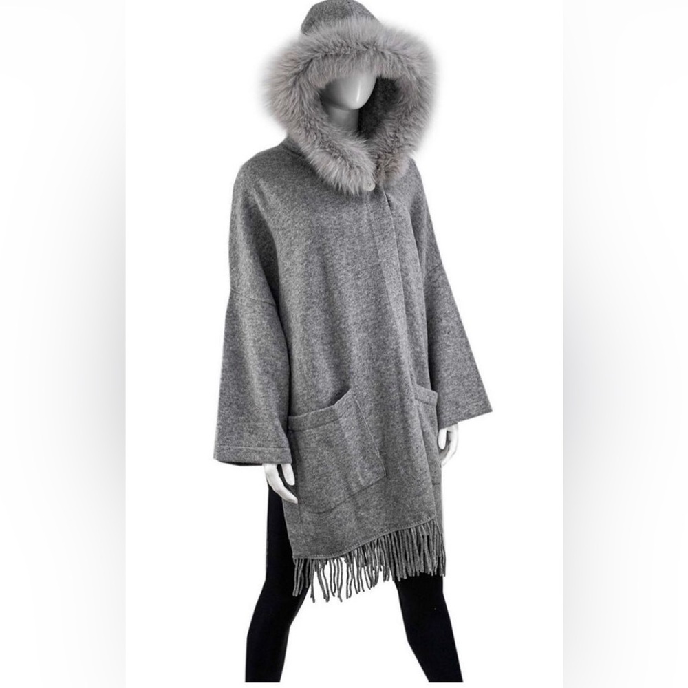 Knitted wool poncho with real fur trim
